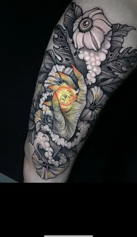 Fotografia real de un tatuaje realista
